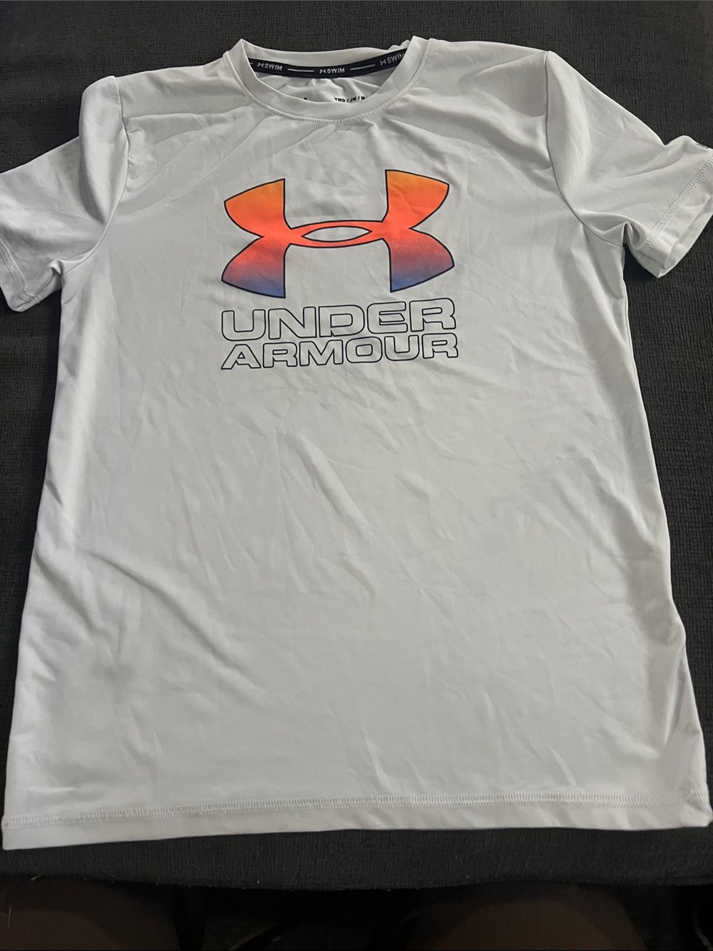 Under Armour Kids White Rashguard with Orange-Red Gradient Logo